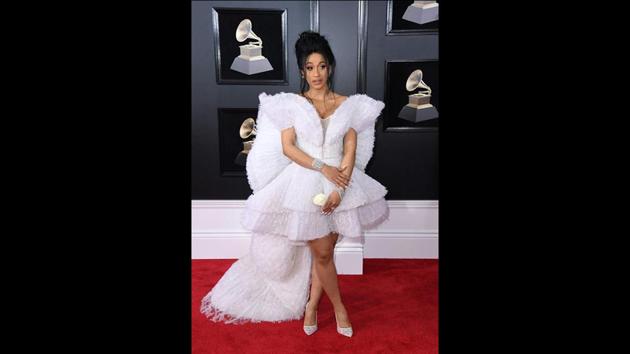 Cardi B also sported the white rose in solidarity with the Time’s Up movement against sexual misconduct on the Grammys red carpet. (Angela Weiss / AFP) Cardi B also sported the white rose in solidarity with the Time’s Up movement against sexual misconduct on the Grammys red carpet. (Angela Weiss / AFP)