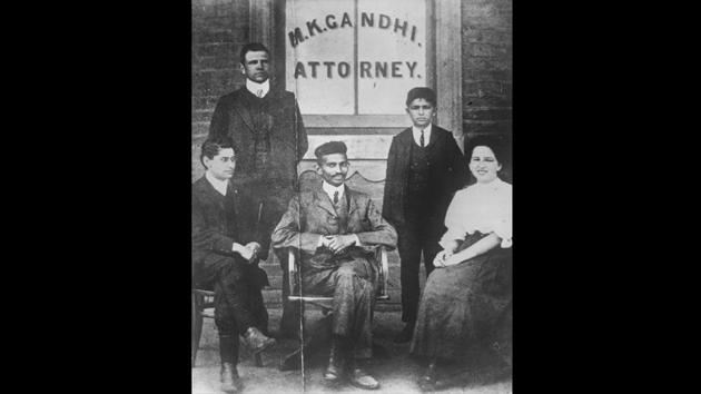 Mohandas Karamchand Gandhi (C) as a young attorney in South Africa with his staff. In the country’s Pietermaritzburg railway station a plaque commemorates the approximate spot where Gandhi fell as he was thrown out of a train for occupying a whites-only compartment in 1893. The incident changed the young lawyer, sowing the seeds of a struggle that was to liberate India decades later in 1947. (Keystone / Getty Images)