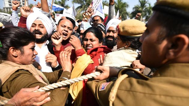 AAP leaders holding a protest march at Patel Chowk on Monday.(Sanchit Khanna/HT PHOTO)