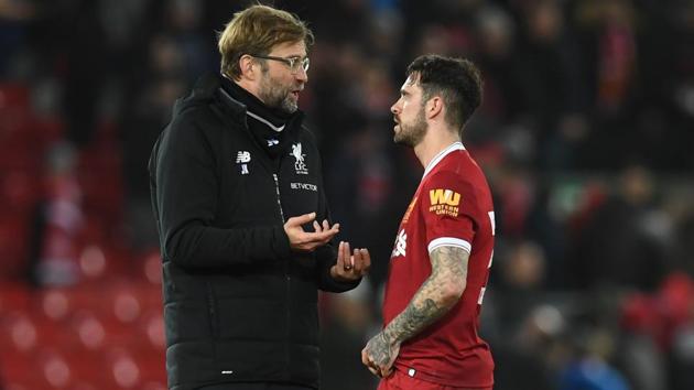 Liverpool's German manager Jurgen Klopp (L) speaks with Liverpool's English striker Danny Ings after the FA Cup fourth round football match between Liverpool and West Bromwich Albion at Anfield in Liverpool, north west England on January 27, 2018. West Brom won the game 3-2. (AFP) Liverpool's German manager Jurgen Klopp (L) speaks with Liverpool's English striker Danny Ings after the FA Cup fourth round football match between Liverpool and West Bromwich Albion at Anfield in Liverpool, north west England on January 27, 2018. West Brom won the game 3-2. (AFP)