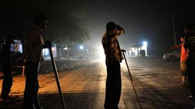 In this file photo, volunteers of a cow vigilante group gather to inspect a truck on a highway in Taranagar in Rajasthan. (AFP File Photo) In this file photo, volunteers of a cow vigilante group gather to inspect a truck on a highway in Taranagar in Rajasthan. (AFP File Photo)