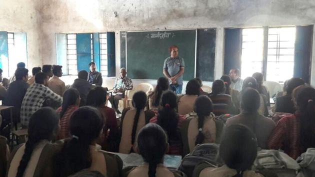Officers take class as part of 'Margdarshan' for tribal youth to guide and prep them for competitive exams at Kotra. (HT PHOTO) Officers take class as part of 'Margdarshan' for tribal youth to guide and prep them for competitive exams at Kotra. (HT PHOTO)