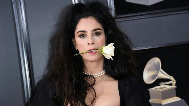 Sarah Silverman poses with a white rose during the 60th Grammy Awards. A host of celebrities flaunted either white ensembles or white roses at the show in support of the Time’s Up movement against sexual harassment. (Angela Weiss / AFP) Sarah Silverman poses with a white rose during the 60th Grammy Awards. A host of celebrities flaunted either white ensembles or white roses at the show in support of the Time’s Up movement against sexual harassment. (Angela Weiss / AFP)