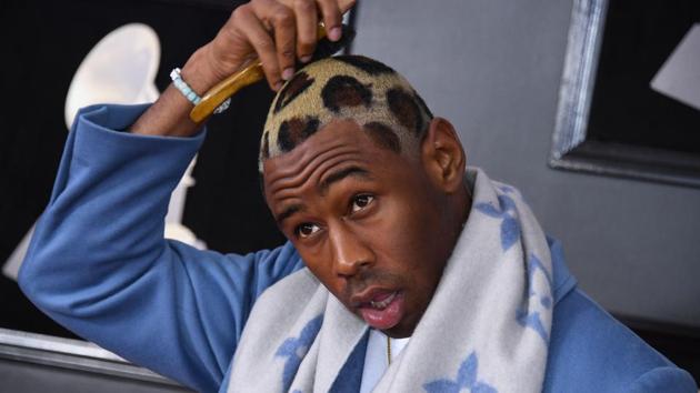 Tyler, the Creator arrives at the gala night with an incredible leopard-print dyed hairdo. (Angela Weiss / AFP) Tyler, the Creator arrives at the gala night with an incredible leopard-print dyed hairdo. (Angela Weiss / AFP)