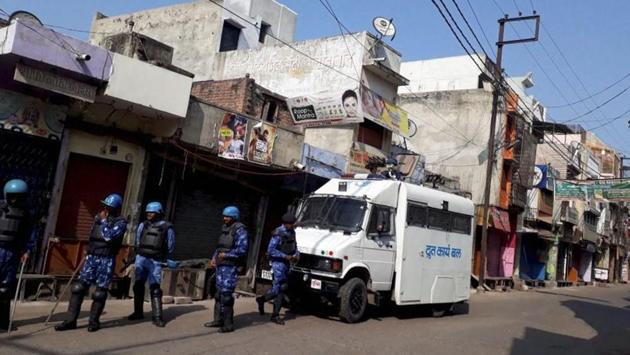 More than 80 persons were arrested while Rapid Action Force (RAF) and Provincial Armed Constabulary (PAC) personnel intensified vigil in Kasganj on Sunday. (PTI Photo) More than 80 persons were arrested while Rapid Action Force (RAF) and Provincial Armed Constabulary (PAC) personnel intensified vigil in Kasganj on Sunday. (PTI Photo)