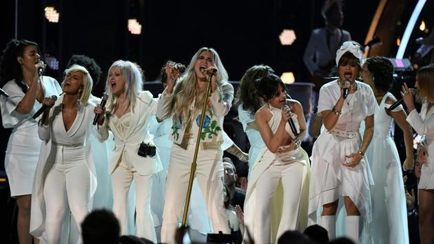 Kesha (C) performs with (from L to R) Bebe Rexha, Cindy Lauper, Camila Cabello and Andra Day during the 60th Annual Grammy Awards show on January 28, 2018, in New York. (AFP) Kesha (C) performs with (from L to R) Bebe Rexha, Cindy Lauper, Camila Cabello and Andra Day during the 60th Annual Grammy Awards show on January 28, 2018, in New York. (AFP)