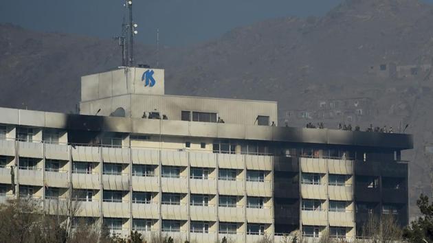 This file photo taken on January 21 shows Afghan security personnel take position at the rooftop of the Intercontinental Hotel during a fight between gunmen and Afghan security forces in Kabul. At least 40 people were killed in the attack on Kabul's luxury Intercontinental Hotel at the weekend, official figures showed on January 25 -- almost double the earlier toll released by Afghan authorities. (AFP) This file photo taken on January 21 shows Afghan security personnel take position at the rooftop of the Intercontinental Hotel during a fight between gunmen and Afghan security forces in Kabul. At least 40 people were killed in the attack on Kabul's luxury Intercontinental Hotel at the weekend, official figures showed on January 25 -- almost double the earlier toll released by Afghan authorities. (AFP)