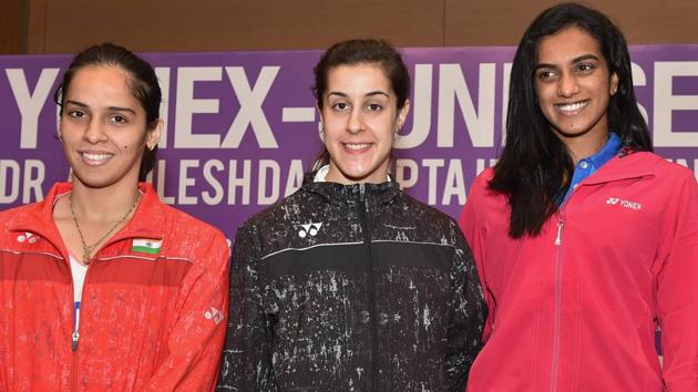 Saina Nehwal, Carolina Marin and PV Sindhu at the opening of the India Open badminton tournament in New Delhi on Tuesday.(PTI)