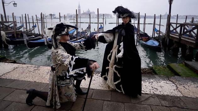 In the past mask makers were highly-regarded members of society, with their own guild and laws governing when people could wear masks. (Filippo Monteforte / AFP) 