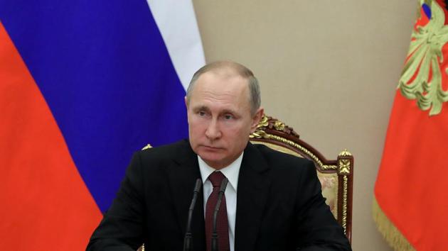 Russian President Vladimir Putin chairs a meeting with members of the national security council at the Kremlin in Moscow. (REUTERS) Russian President Vladimir Putin chairs a meeting with members of the national security council at the Kremlin in Moscow. (REUTERS)