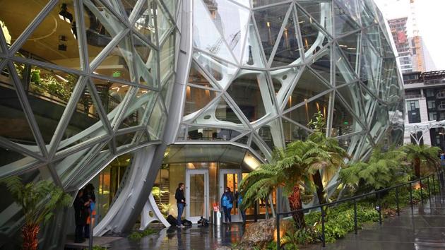 The Amazon Spheres seen from the lower level entrance after an opening event at Amazon's Seattle headquarters. From the fourth floor of a striking rainforest-like conservatory built of glass and white steel, the world’s richest man ordered out loud, “Alexa, open The Spheres.” (Lindsey Wasson / REUTERS) The Amazon Spheres seen from the lower level entrance after an opening event at Amazon's Seattle headquarters. From the fourth floor of a striking rainforest-like conservatory built of glass and white steel, the world’s richest man ordered out loud, “Alexa, open The Spheres.” (Lindsey Wasson / REUTERS)