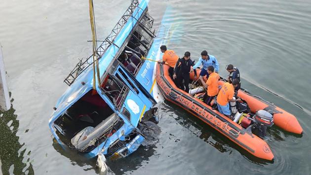 The death toll in the bus accident in Behrampore in Bengal rose to 42 on Tuesday with rescuers retrieving six more bodies from the canal where the vehicle plunged Monday morning. Locals suspect about 10-12 bodies could still be trapped in the mud. (AFP) The death toll in the bus accident in Behrampore in Bengal rose to 42 on Tuesday with rescuers retrieving six more bodies from the canal where the vehicle plunged Monday morning. Locals suspect about 10-12 bodies could still be trapped in the mud. (AFP)