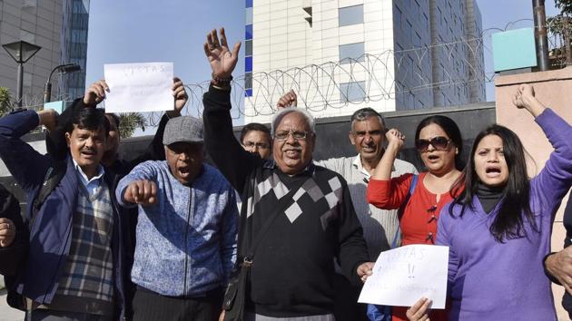 Gurgaon, India - Jan. 30, 2018: Unitech Vista home buyers protest outside the Unitech House office at Sector 45, in Gurgaon, India, on Tuesday, January 30, 2018. (Photo by Sanjeev Verma/ Hindustan Times)(Sanjeev Verma/HT PHOTO)