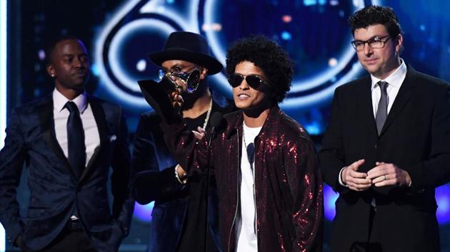Bruno Mars receives a second Grammy for Record of the Year during the 60th Annual Grammy Awards show on January 28, 2018, in New York. (AFP Photo) Bruno Mars receives a second Grammy for Record of the Year during the 60th Annual Grammy Awards show on January 28, 2018, in New York. (AFP Photo)