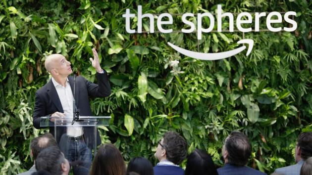 Jeff Bezos, speaks during the opening of the Amazon Spheres. Though masked by nature, the sleek and minimalist “alternative work space” is also designed to make you forget you’re at work. (Jason Redmond / AFP) Jeff Bezos, speaks during the opening of the Amazon Spheres. Though masked by nature, the sleek and minimalist “alternative work space” is also designed to make you forget you’re at work. (Jason Redmond / AFP)