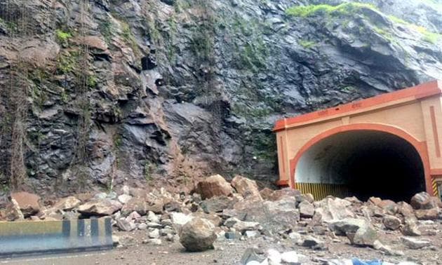 Work is underway near Adoshi tunnel on the Expressway, where landslides (in pic) are common during monsoons. (HT File Photo) Work is underway near Adoshi tunnel on the Expressway, where landslides (in pic) are common during monsoons. (HT File Photo)