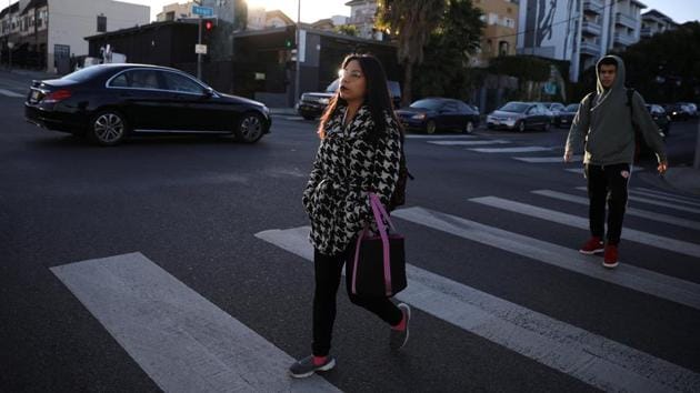 Karla Estrada, 26, is a paralegal preparing for law school. “DACA has always been very problematic and temporary. It has given us the liberty to work, legally, without fear that in three months we’re going to get fired because we have no social [security number]... I think it’s important for all recipients to understand that DACA... does not define who you are as a human being and does not give you any more or any less dignity,” she said. (Lucy Nicholson / REUTERS) 