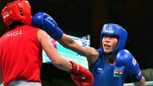 MC Mary Kom (right) jabs and scores agaisnt Altansetseg Lutsaikhan of Mongolia during their semifinal bout at the India Open International Boxing tournament in New Delhi on Wednesday. (PTI) MC Mary Kom (right) jabs and scores agaisnt Altansetseg Lutsaikhan of Mongolia during their semifinal bout at the India Open International Boxing tournament in New Delhi on Wednesday. (PTI)