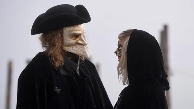 With several distinct types of masks including the beaked ‘Medico Della Peste’ or plague doctor mask symbolic of the carnival, a key event of the three-week affair is the competition to judge the most beautiful mask. (Filippo Monteforte / AFP) 