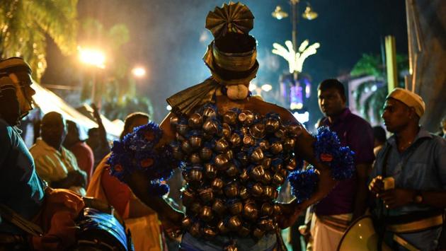 With the eclipse is taking place from 6:51 pm to 11:11 pm this year, the procession - which lasted about 24 hours in past years - had been cut short as temples close after sunset in Singapore. (Manan Vatsyayana / AFP) With the eclipse is taking place from 6:51 pm to 11:11 pm this year, the procession - which lasted about 24 hours in past years - had been cut short as temples close after sunset in Singapore. (Manan Vatsyayana / AFP)