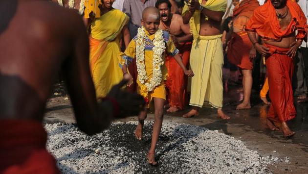 A boy walks over embers as he takes part in the Thaipusam festival in Chennai. Hundreds of thousands of Hindus across Malaysia, Singapore, India and Sri Lanka celebrated the annual festival, with many piercing their skin with hooks and skewers to show devotion to the deity Murugan. (P. Ravikumar / REUTERS) A boy walks over embers as he takes part in the Thaipusam festival in Chennai. Hundreds of thousands of Hindus across Malaysia, Singapore, India and Sri Lanka celebrated the annual festival, with many piercing their skin with hooks and skewers to show devotion to the deity Murugan. (P. Ravikumar / REUTERS)