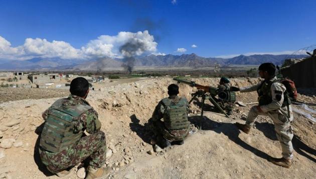 Afghan security forces take position during a gun battle between Taliban and security forces in Laghman province. (REUTERS) Afghan security forces take position during a gun battle between Taliban and security forces in Laghman province. (REUTERS)
