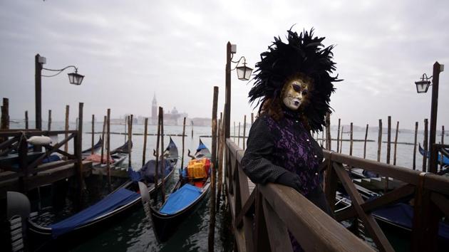 The festival was abandoned during the rule of the Holy Roman Emperor Francis II in 1797, and stayed so until 1980 when the government revived the carnival to promote Venetian history and culture. (Filippo Monteforte / AFP) 