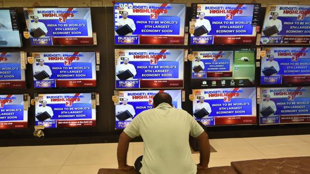 A man in Mumbai watches televisions playing Finance Minister Arun Jaitley presenting the union budget on Thursday, February 1. (Kunal Patil/ HT Photo) A man in Mumbai watches televisions playing Finance Minister Arun Jaitley presenting the union budget on Thursday, February 1. (Kunal Patil/ HT Photo)