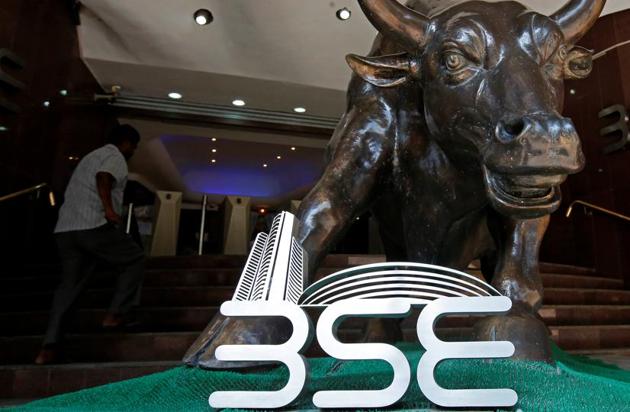 The Bombay Stock Exchange (BSE) logo is seen under a bull statue at the entrance of their building in Mumbai, India January 30, 2018. Picture taken January 30, 2018. REUTERS/Shailesh Andrade(REUTERS)