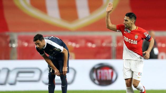 Monaco's Radamel Falcao (R) celebrates after scoring goal during the French League Cup semi-final between Monaco and Montpellier at the Louis II stadium in Monaco on January 31, 2018. (AFP) Monaco's Radamel Falcao (R) celebrates after scoring goal during the French League Cup semi-final between Monaco and Montpellier at the Louis II stadium in Monaco on January 31, 2018. (AFP)
