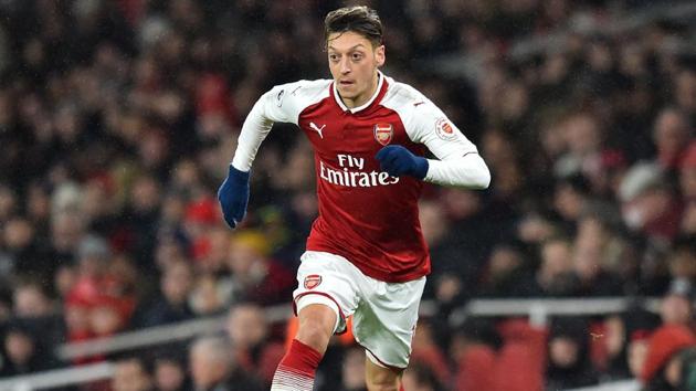 Mesut Ozil has signed a three-and-a-half-year contract extension with Arsenal to end the saga over his future at the club.(AFP)