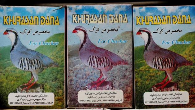 Grain boxes are seen for sale in a shop at the Ka Faroshi bird market in Kabul, Afghanistan. (Mohammad Ismail / REUTERS)