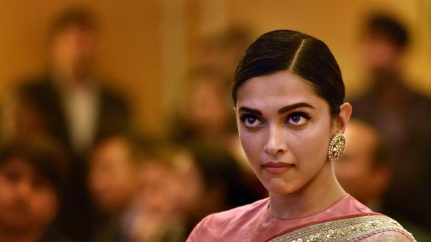 Deepika Padukone gets emotional during presentation of BAI's Lifetime Achievement Award to her father Prakash Padukone at a function in New Delhi. (PTI) Deepika Padukone gets emotional during presentation of BAI's Lifetime Achievement Award to her father Prakash Padukone at a function in New Delhi. (PTI)