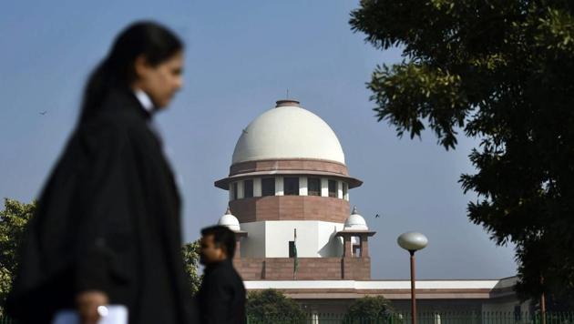 A view of the Supreme Court, in New Delhi. A five-judge bench headed by Chief Justice Dipak Misra is hearing cases challenging the validity of Aadhaar. (PTI) A view of the Supreme Court, in New Delhi. A five-judge bench headed by Chief Justice Dipak Misra is hearing cases challenging the validity of Aadhaar. (PTI)