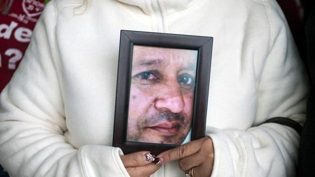 A woman holds a picture of a missing relative outside the attorney's office after a march for the disappeared in Monterrey, Mexico, on January 31, 2018. (Julio Cesar Aguilar / AFP) A woman holds a picture of a missing relative outside the attorney's office after a march for the disappeared in Monterrey, Mexico, on January 31, 2018. (Julio Cesar Aguilar / AFP)