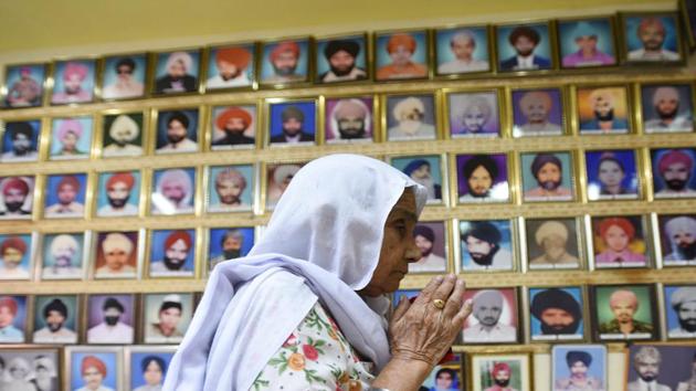 A woman pays tribute to victims of 1984 anti-Sikh riots. If we wish to expose something dreadful done by party A, we feel a need to balance it by finding a fault in party B. (Sanchit Khanna/ HT Photo) A woman pays tribute to victims of 1984 anti-Sikh riots. If we wish to expose something dreadful done by party A, we feel a need to balance it by finding a fault in party B. (Sanchit Khanna/ HT Photo)