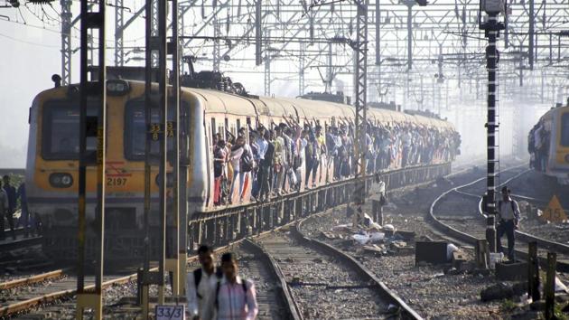A local train arrives at a station in Mumbai. (PTI File Photo) A local train arrives at a station in Mumbai. (PTI File Photo)