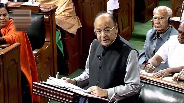 Union finance minister Arun Jaitley presents the Union Budget at Parliament, in New Delhi .(PTI)