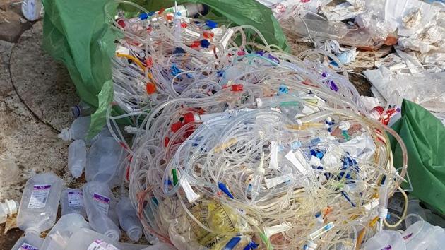 The garbage bags seized from the three trucks had Fortis written on them. (HT Photo) The garbage bags seized from the three trucks had Fortis written on them. (HT Photo)