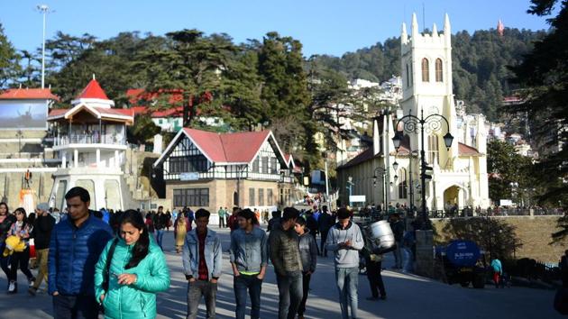 People stroll at the Ridge, which is a popular tourist spot. The ridge ground was constructed in 1910, when Shimla was the summer capital of British India. (Deepak Sansta/HT File Photo) People stroll at the Ridge, which is a popular tourist spot. The ridge ground was constructed in 1910, when Shimla was the summer capital of British India. (Deepak Sansta/HT File Photo)