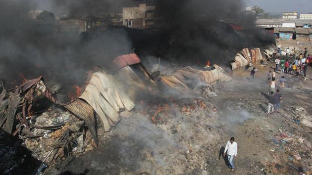 A major fire broke out in Bhiwandi, around 30km from Mumbai, early Wednesday, gutting 15 scrap godowns and six shanties. There were no casualties. (Praful Gangurde / HT Photo) A major fire broke out in Bhiwandi, around 30km from Mumbai, early Wednesday, gutting 15 scrap godowns and six shanties. There were no casualties. (Praful Gangurde / HT Photo)