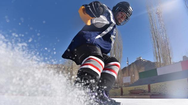 A member of the women’s ice hockey team practices during a workshop conducted by Canadian players at the Karzu ring in Leh. Internationally, the game is played on artificial rinks which are much larger and smoother than the natural ice rinks the team is used to playing on. (Sanchit Khanna / HT Photo) A member of the women’s ice hockey team practices during a workshop conducted by Canadian players at the Karzu ring in Leh. Internationally, the game is played on artificial rinks which are much larger and smoother than the natural ice rinks the team is used to playing on. (Sanchit Khanna / HT Photo)