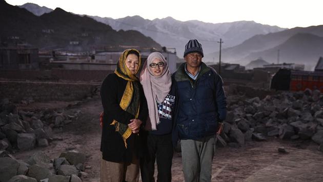 Shabina Kausar, a member of the national women’s ice hockey team, with her parents outside her home in Skamparay in Leh. (Sanchit Khanna / HT Photo) Shabina Kausar, a member of the national women’s ice hockey team, with her parents outside her home in Skamparay in Leh. (Sanchit Khanna / HT Photo)
