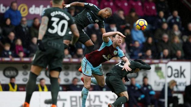 Burnley's Ashley Barnes in action with Manchester City's Vincent Kompany and Brahim Diaz in the Premier League on Saturday. (Reuters) Burnley's Ashley Barnes in action with Manchester City's Vincent Kompany and Brahim Diaz in the Premier League on Saturday. (Reuters)