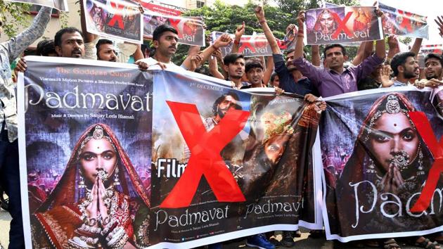 Activists of Rashtriya Rajput Karni Sena holding banners and raising slogans during a protest against the release of the film ‘Padmaavat’ in Coimbatore on Thursday.(PTI Photo) Activists of Rashtriya Rajput Karni Sena holding banners and raising slogans during a protest against the release of the film ‘Padmaavat’ in Coimbatore on Thursday.(PTI Photo)