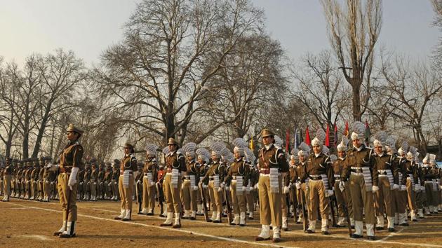 Female members of the Jammu and Kashmir police take part during the full dress rehearsal for the Republic Day parade in Sher-e-Kashmir Stadium in Srinagar on January 24.(Waseem Andrabi /HT Photo)
