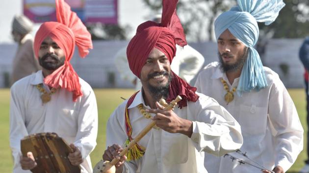 Bhangra Boys performing at the 82nd Kila Raipur Rural Olympics 2018 at Kila Raipur village near Ludhiana on Friday. (GURPREET SINGH/HT)