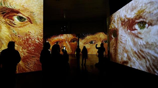 People visit the exhibition "Van Gogh Alive - The Experience", life and work of Vincent Van Gogh from 1880 until 1890 on February 02, 2018 in Sevilla. (Cristina Quicler / AFP) People visit the exhibition "Van Gogh Alive - The Experience", life and work of Vincent Van Gogh from 1880 until 1890 on February 02, 2018 in Sevilla. (Cristina Quicler / AFP)