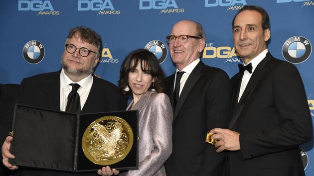 Alexandre Desplat, from right, Richard Jenkins and Sally Hawkins pose in the press room with Guillermo del Toro, winner of the award for outstanding directorial achievement in a feature film for "The Shape of Water" at the 70th annual Directors Guild of America Awards on Saturday. (Chris Pizzello/Invision/AP) Alexandre Desplat, from right, Richard Jenkins and Sally Hawkins pose in the press room with Guillermo del Toro, winner of the award for outstanding directorial achievement in a feature film for "The Shape of Water" at the 70th annual Directors Guild of America Awards on Saturday. (Chris Pizzello/Invision/AP)