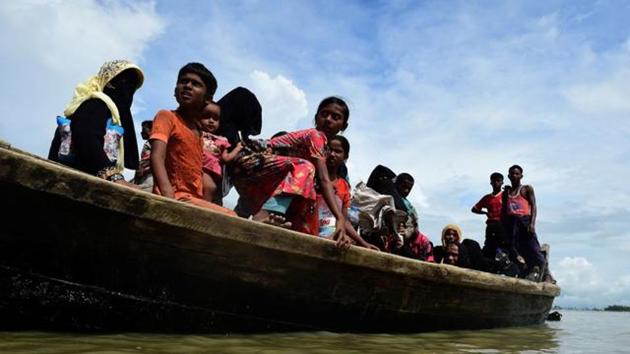 Rohingya Muslim refugees disembark from a boat on the Bangladeshi side of Naf river in Teknaf on September 12, 2017. (AFP File) Rohingya Muslim refugees disembark from a boat on the Bangladeshi side of Naf river in Teknaf on September 12, 2017. (AFP File)
